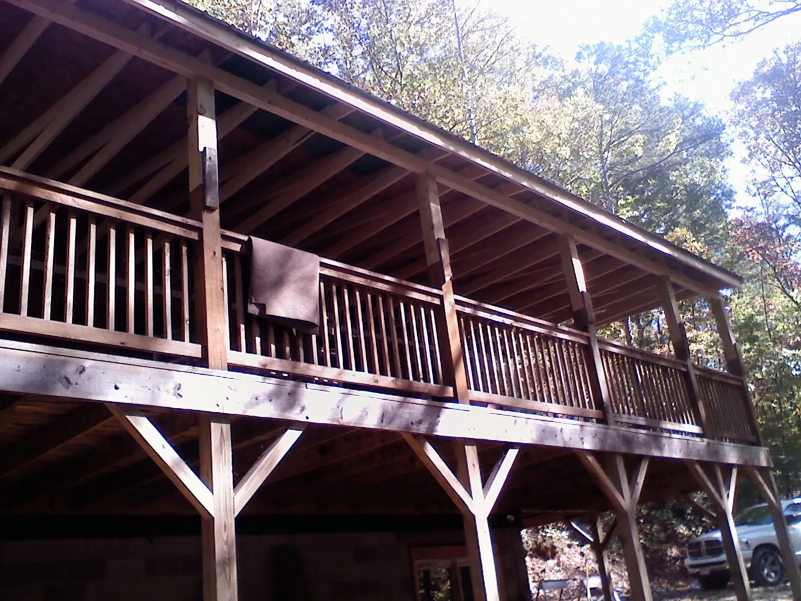 Timber framing under a new elevated porch and deck — Roof Leak Repair in Watonga by Roofing Brothers